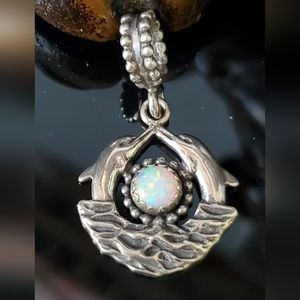 Vintage sterling silver leaping dolphins and created opal cabochon pendant